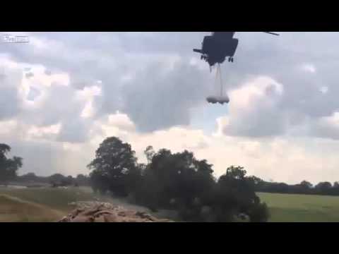 Funny  Things   Funny Videos   Sikorsky CH 53 Helicopter delivers sandbags for flood protection wall