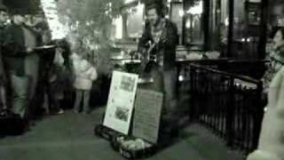 Raine Maida busks in Toronto for War Child Canada