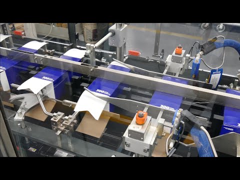 Nigrelli HSC 400 Cartoner, KD 40 Case Packer - Stacks of Z Fold Aluminum Foil