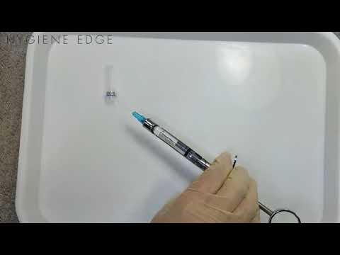 Scoop technique for recapping a needle