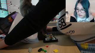 Hyoon leaning over a table