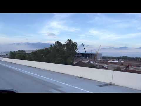 Tesla’s Gigafactory is HUGE! Highway drive by
