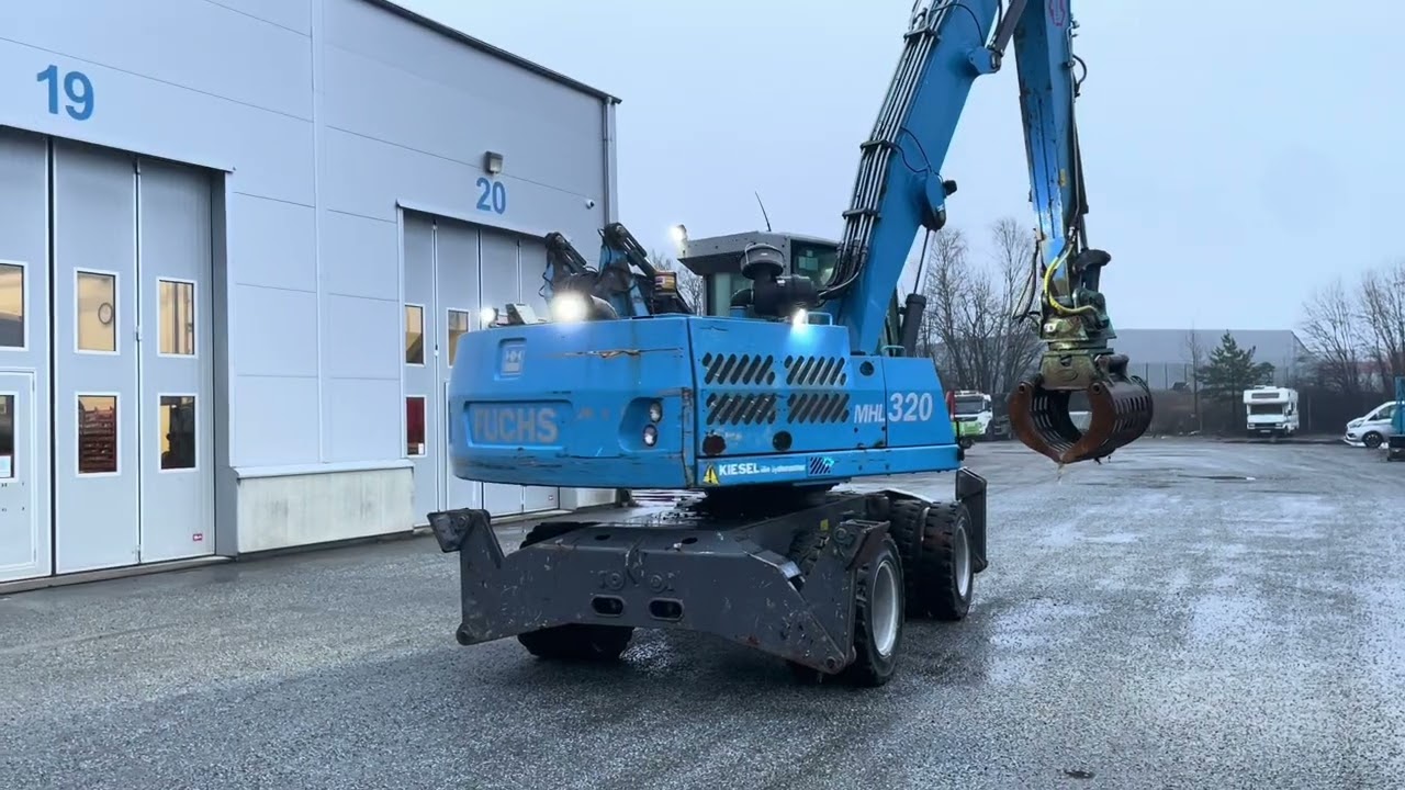 Materialhanterare Fuchs MHL 320 -2015 | Grip | Höj- och sänkbar hytt