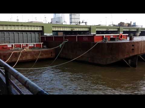 Sound of a metal barge hitting the dock