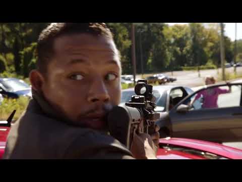 Sabotage trailer frame — corridor shootout and percussive score stabs