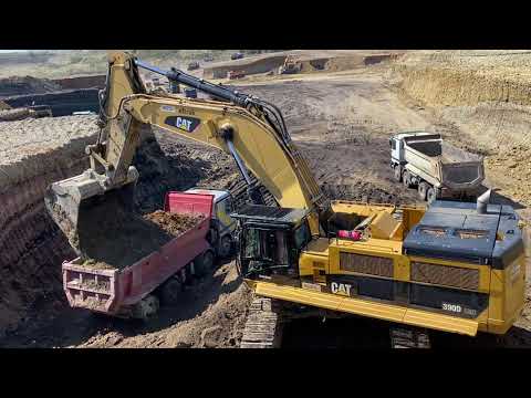 Caterpillar 390D Excavator Loading Trucks