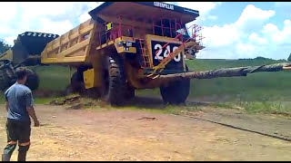 70ton dumper stuck in mud pulled by D10 dozer