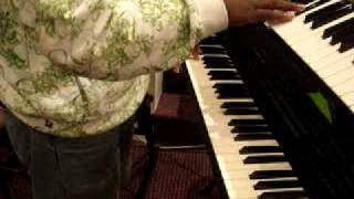 Einstein playing keyboard at church