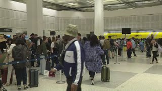Travellers face long TSA lines as partial government shutdown continues