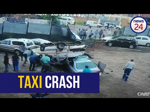WATCH | Taxi crashes through wall in Durban, flipping and landing on its roof