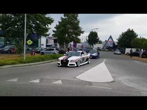 Cars entering/leaving showoff imports meet