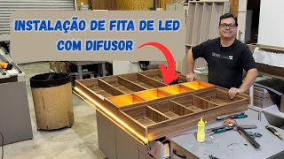 Installation of LED strip with diffuser in upper bathroom cabinets