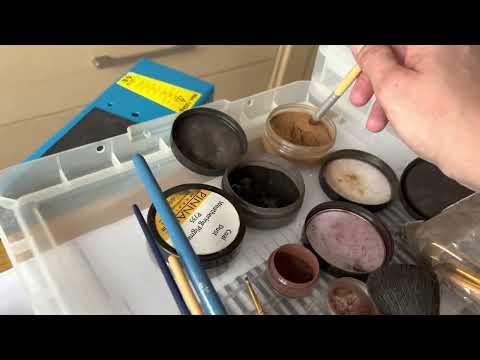 Track ballasting and weathering