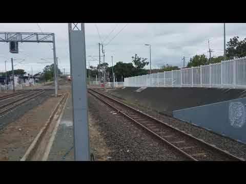Queensland Rail 2158, 2473 and 1754 lead #PW57 Northbound through Lawnton Station.