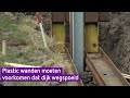 Wanden van plastic moeten voorkomen dat dijk wegspoelt