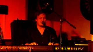 John Garrison talking about and singing part of "Happy Hour"