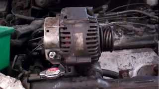 Adjusting alternator belt tension - bolt & pivot bracket design