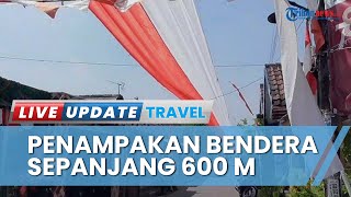 Warga Sidoarjo Bentangkan Bendera Merah Putih 600 Meter di Sepanjang Jalan Kampung Tulangan Sidoarjo