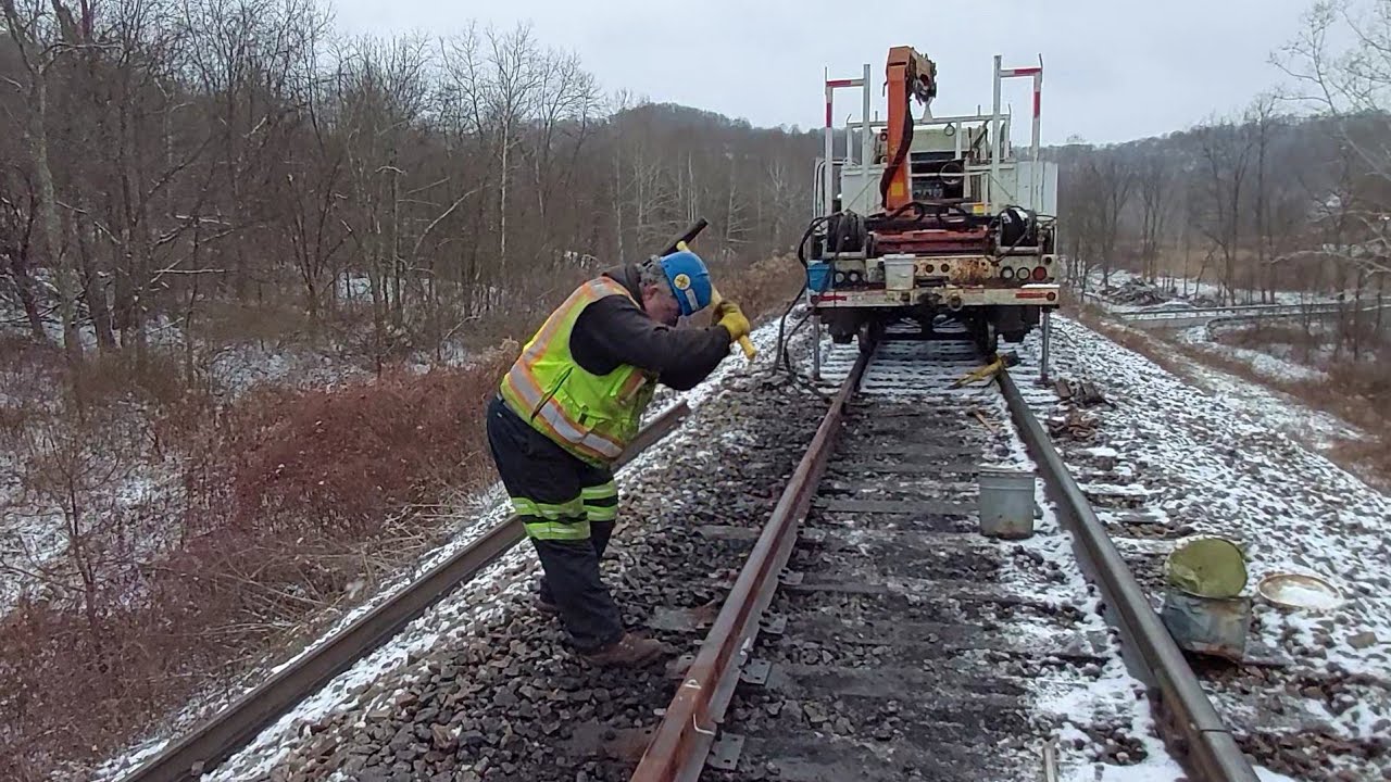 Windmill Spiking and Driving Railroad Spikes