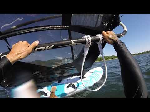 Windsurfing Waterstart on a cambered sail