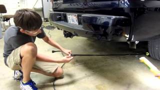 Harley & Jude change tire on a 2007 Chevy Avalanche