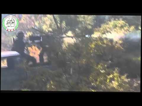 استهداف تحصينات قوات النظام في برج زاهية بواسطة رشاش 14  أثناء معركة السيطرة على زاهية من قبل اللواء العاشر في الساحل