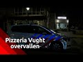De politie doet onderzoek rond de pizzeria in Vught waar de overval plaatsvond