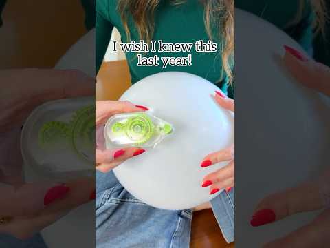 Use double sided tape to make balloons stick to the ceiling! #balloons #party #newyear