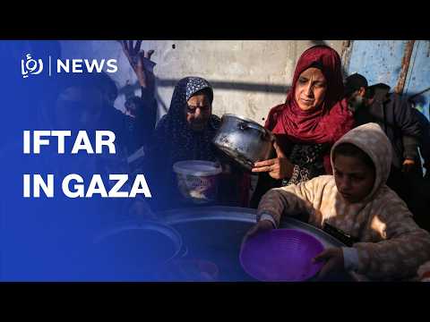 Palestinians line up for hot Ramadan meals in Gaza