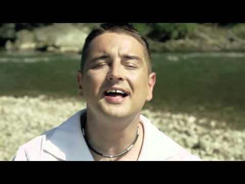 Rajmund - Nikt tak nie całuje ( Oficjalny Teledysk )