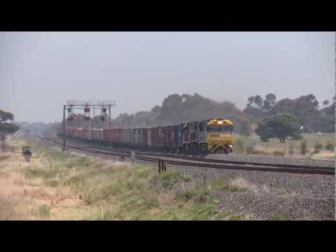 A very long Adelaide to Melbourne freight train in country Victoria - railroads and trains
