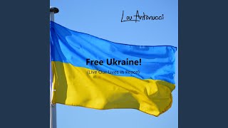 Kadr z teledysku Free Ukraine! (Live Our Lives In Peace) tekst piosenki Lou Antonucci