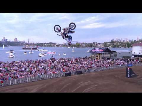 Dirt bike backflips a V8 Supercar