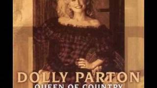 Dolly Parton sitting on the front porch swing