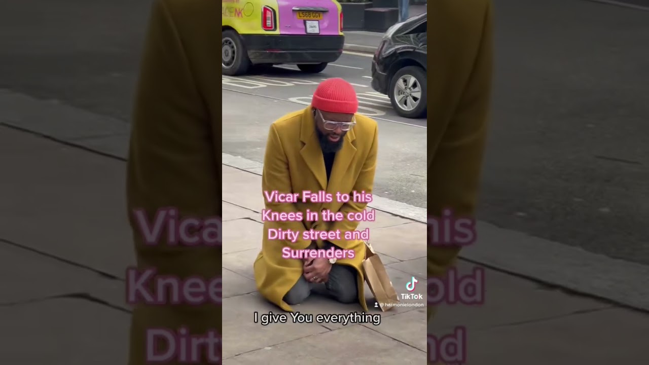 Vicar Falls to his Knees in the cold Dirty street and Surrenders