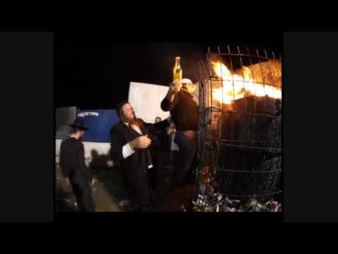 Guma Aguiar lighting the torch on Lag B'Omer 2009 in Meron, Israel filmed by Tovia Singer