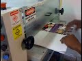 Video of applying UV Coating on the printed folder.