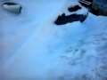 Машину замело снегом 