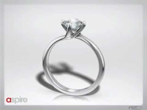 Four Claw Twist Round Diamond Engagement Ring
