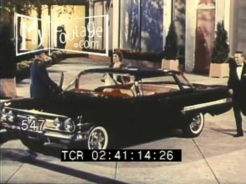 1950s Couple Climbs Into New Car W/ Valet Attendant Seeing Them Off