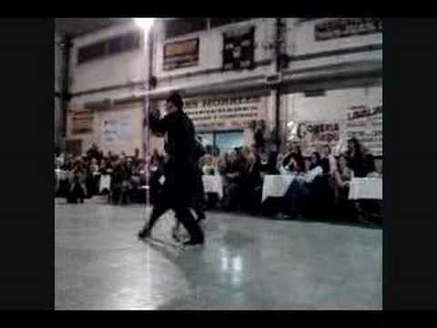  Osvaldo Zotto,    Miguel Angel Zotto,    Romina Levin,    and  Lorena Ermocida  are  dancing  to  the  tango  "  Que Te Importa Que Te Llore  "
