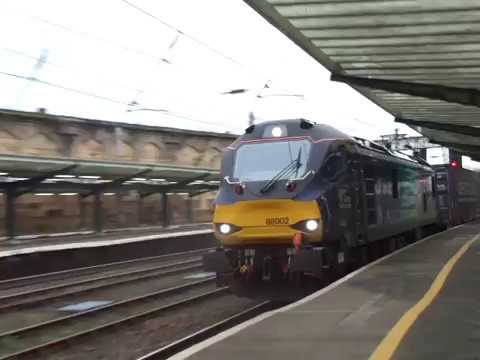 The Class 88 DRS No.88002 'Prometheus' with Rail Containers was passing at Carlisle Citadel Station.