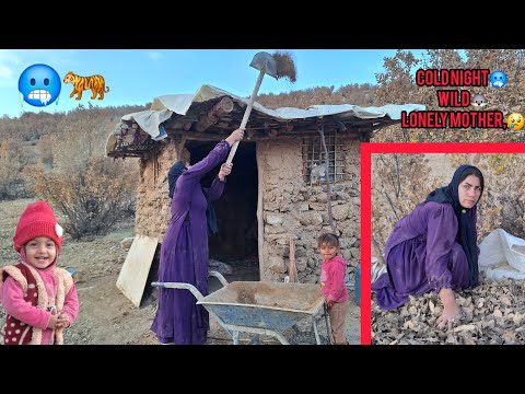 A mother builds the roof of her hut in the deadly cold and snow