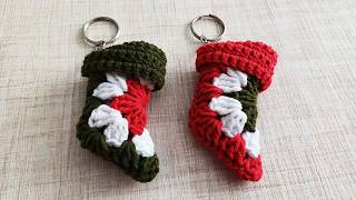 Adorable mini crochet keychain Christmas stockings filled with candy!