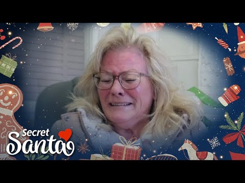 Woman who lost nearly everything in house fire sobs after opening gift from a Secret Santa