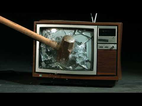 slow motion smashing tv screen with sledgehammer