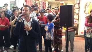 Kashy Keegan performing This Is My Dream in the street of Mong Kok, Hong Kong