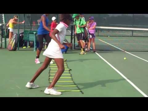 Cori Gauff and Hurricane Tyra Black doing ladder warm up drills