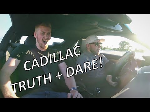 Racing a Cadillac ATS-V and CTS-V!!