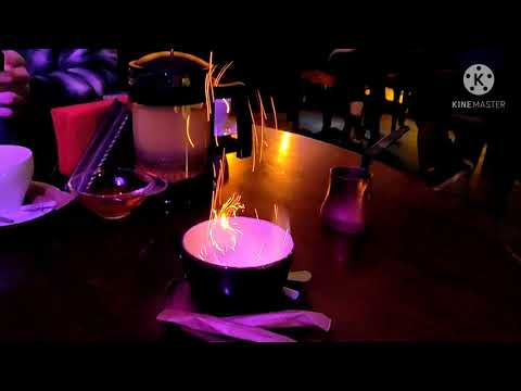 Dzyga Lviv restaurant, hot coffee with rum - палаюча кава з ромом, ресторан арт-центр "Дзиґа" Львів.